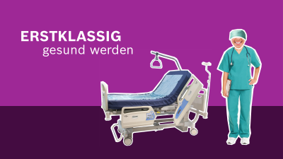 Neben einem Krankenbett steht eine Pflegerin. 